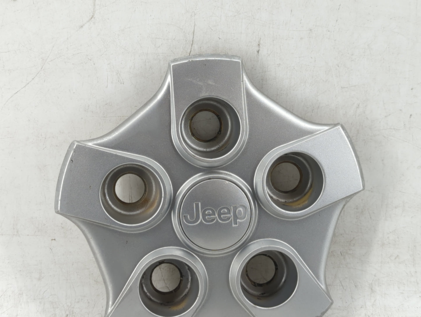 2017 Jeep Patriot Rim Wheel Center Cap Silver - Oemusedautoparts1.com