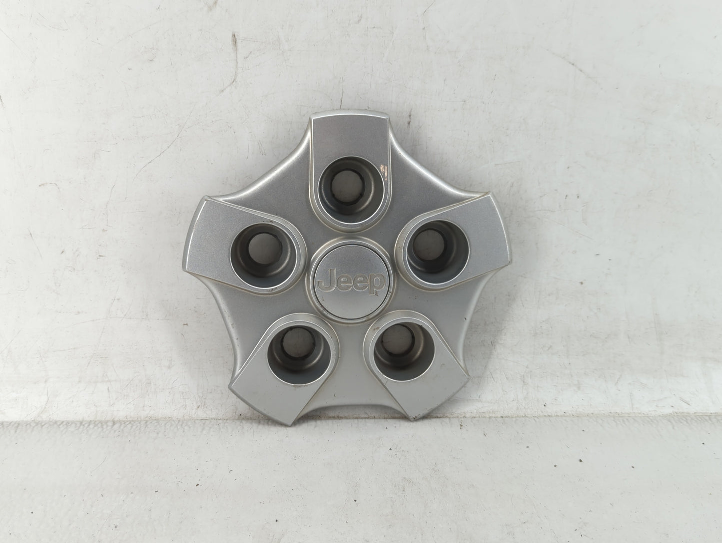 2017 Jeep Patriot Rim Wheel Center Cap Silver - Oemusedautoparts1.com
