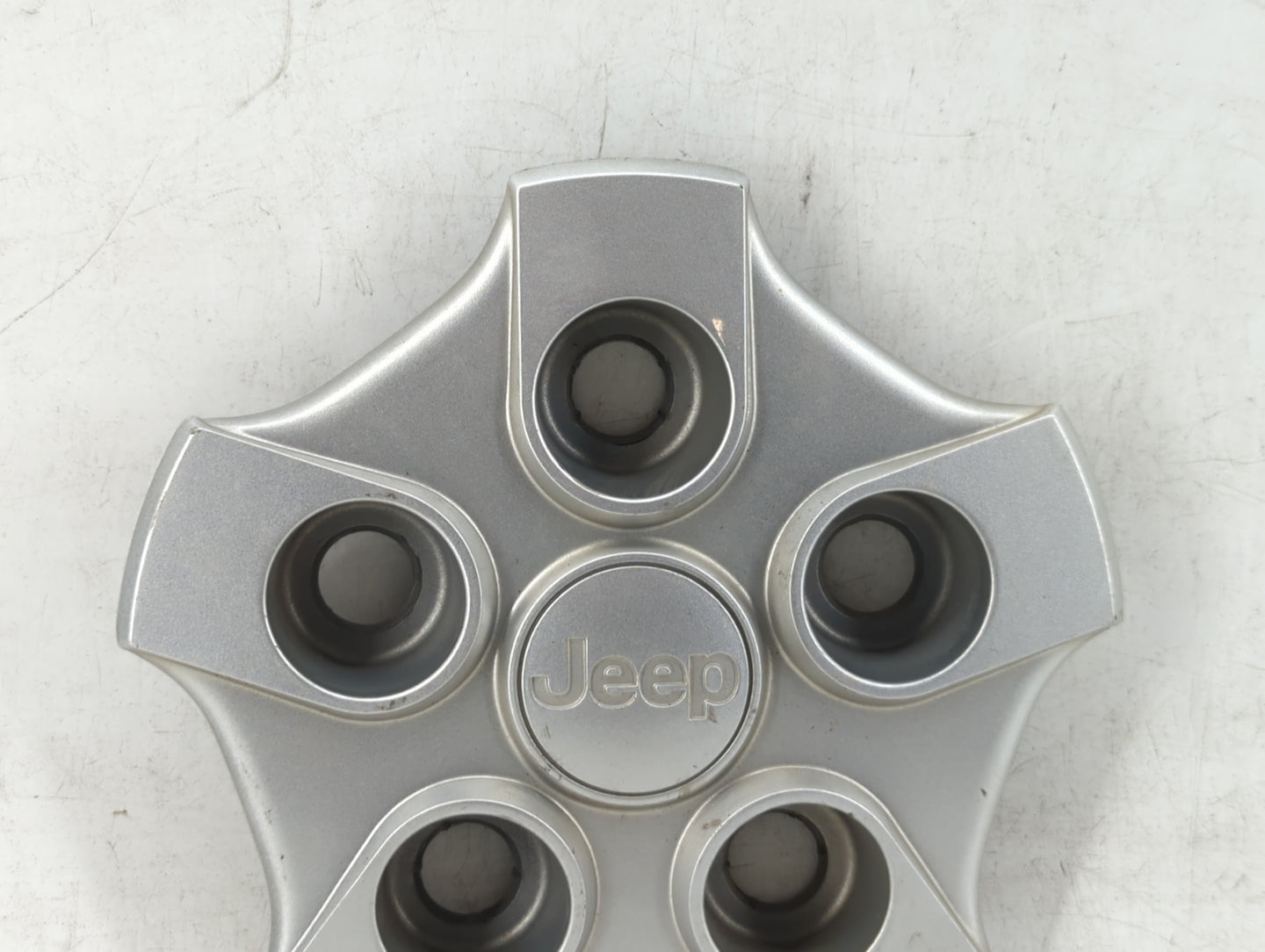 2017 Jeep Patriot Rim Wheel Center Cap Silver - Oemusedautoparts1.com