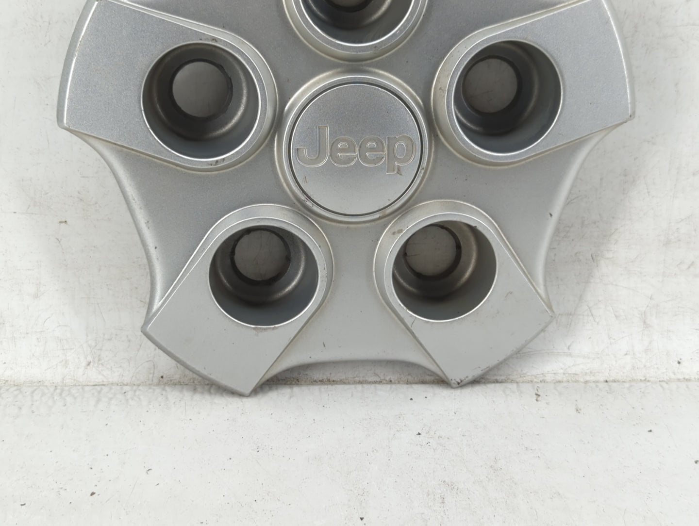 2017 Jeep Patriot Rim Wheel Center Cap Silver - Oemusedautoparts1.com