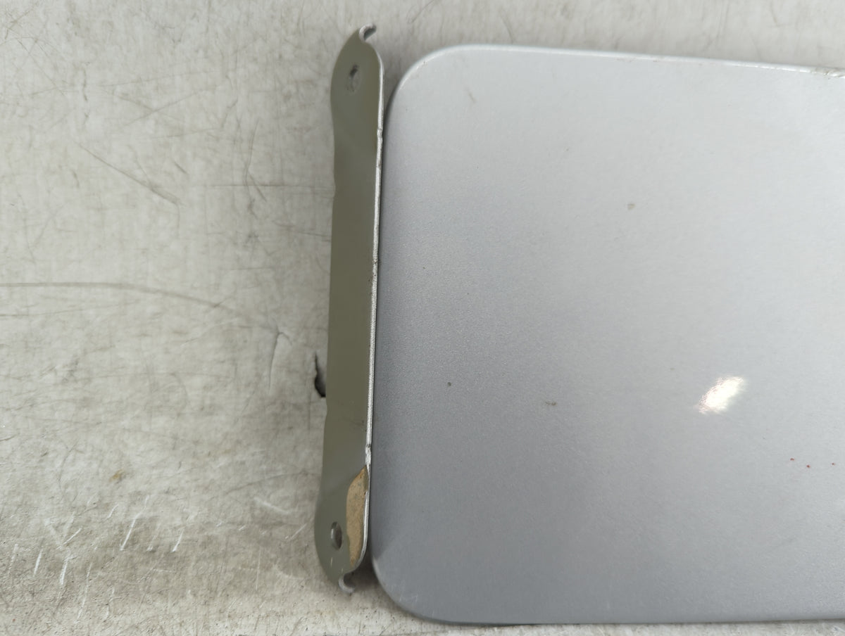 2017 Nissan Versa Fuel Tank Door Lid Gas Tank Silver - Oemusedautoparts1.com