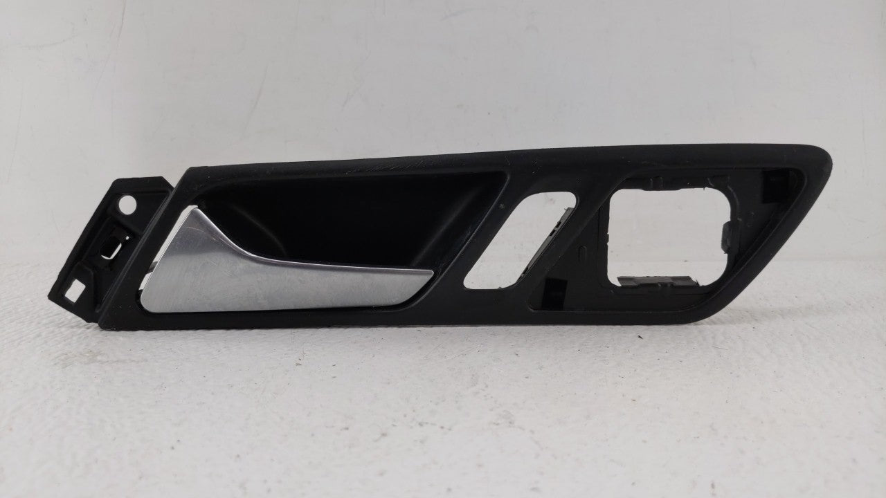 2017 Volkswagen Jetta LEFT FRONT DOOR INSIDE HANDLE LOCK BEZEL - Oemusedautoparts1.com