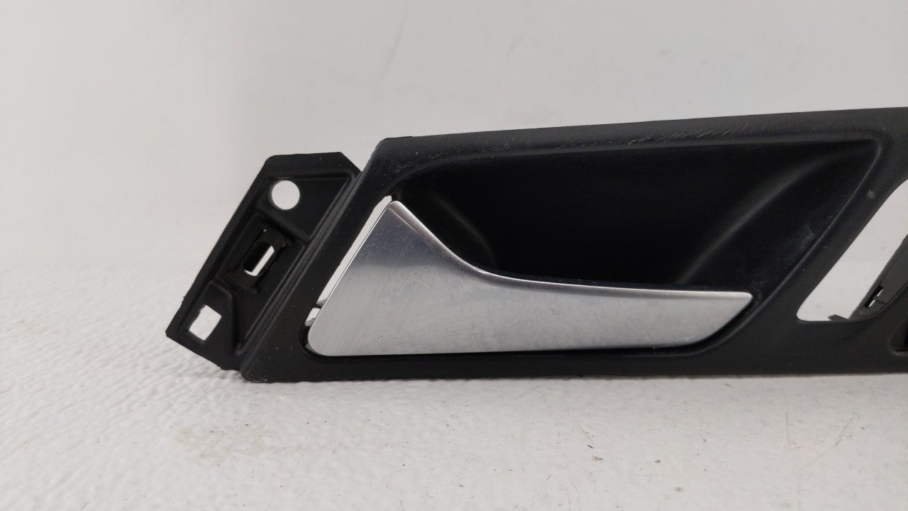 2017 Volkswagen Jetta LEFT FRONT DOOR INSIDE HANDLE LOCK BEZEL - Oemusedautoparts1.com