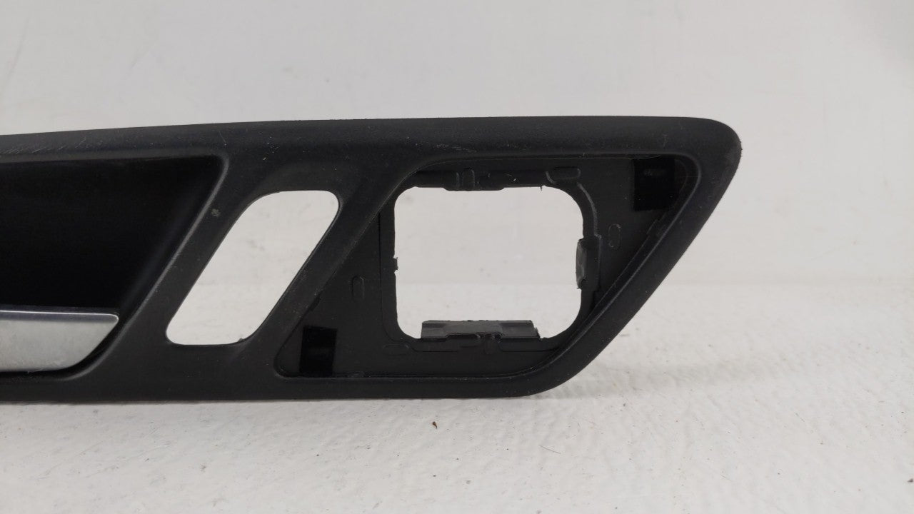 2017 Volkswagen Jetta LEFT FRONT DOOR INSIDE HANDLE LOCK BEZEL - Oemusedautoparts1.com