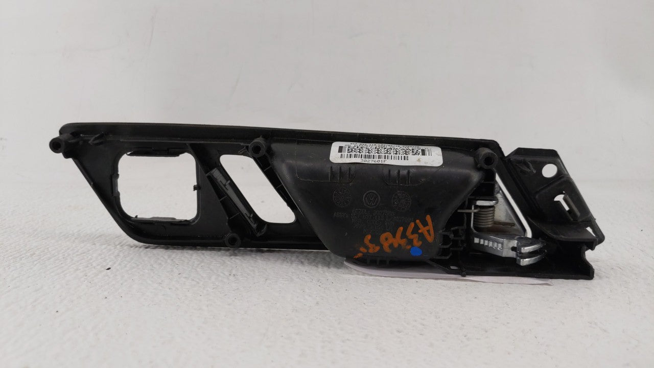 2017 Volkswagen Jetta LEFT FRONT DOOR INSIDE HANDLE LOCK BEZEL - Oemusedautoparts1.com