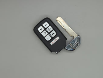 compare product Honda Odyssey Keyless Entry Remote Fob KR5T4X driver1 72147-THR-A61 7 buttons