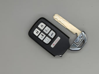 compare product Honda Odyssey Keyless Entry Remote Fob KR5T4X 72147-THR-A51 7 buttons