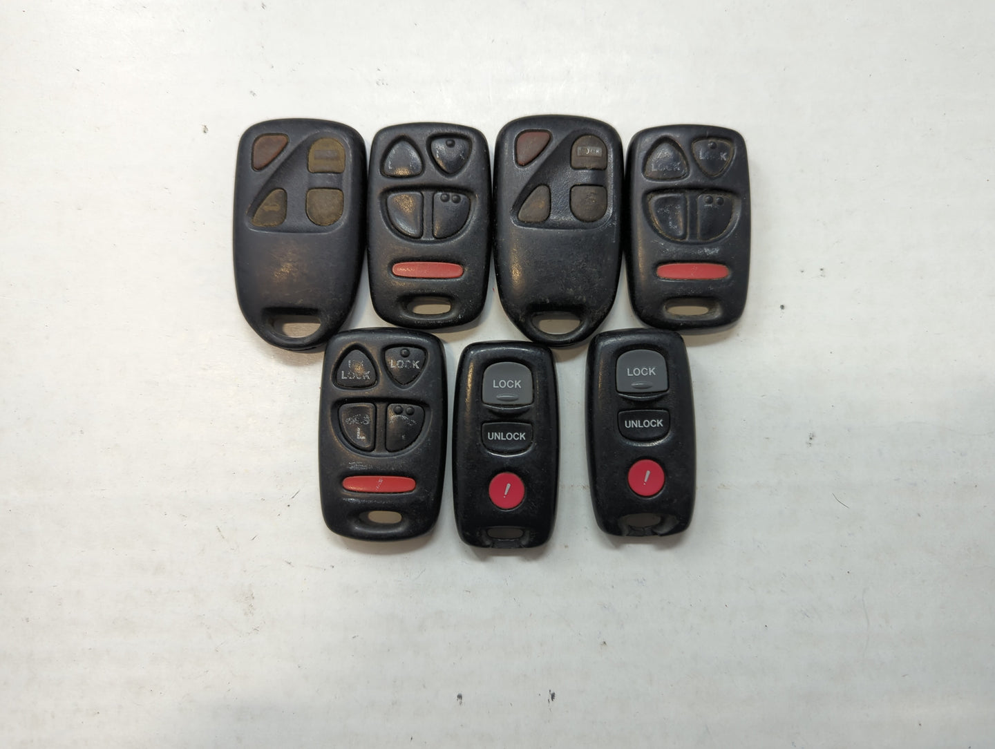 Lot of 7 Mazda Keyless Entry Remote Fob MIXED FCC IDS MIXED PART NUMBERS - Oemusedautoparts1.com