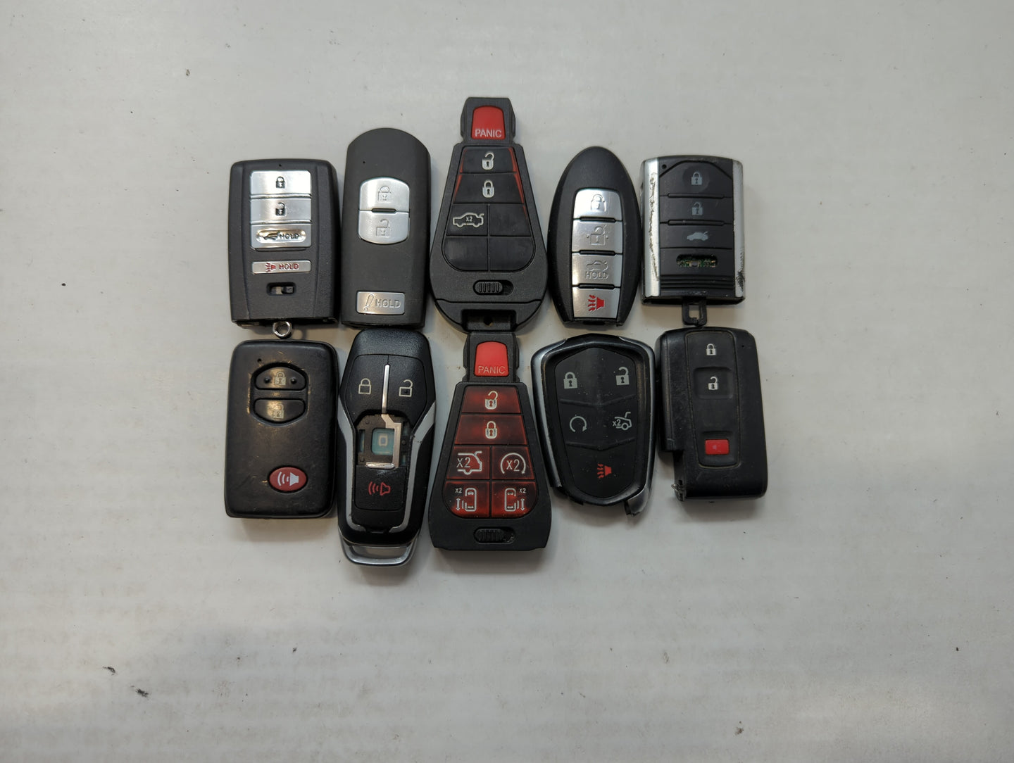 Lot of 10 Aftermarket Keyless Entry Remote Fob MIXED FCC IDS MIXED PART - Oemusedautoparts1.com