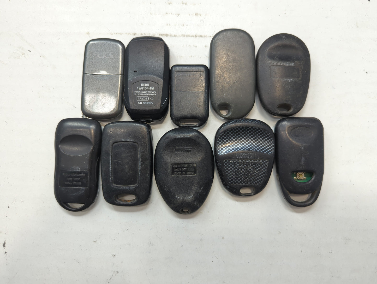 Lot of 10 Aftermarket Keyless Entry Remote Fob MIXED FCC IDS MIXED PART - Oemusedautoparts1.com