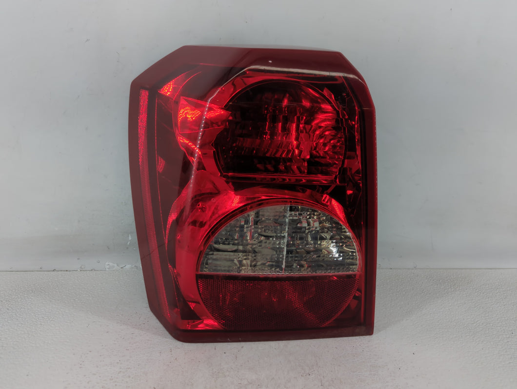 2008-2012 Dodge Caliber Tail Light Assembly Driver Left OEM P/N:320079 3320077 Fits Fits 2008 2009 2010 2011 2012 OEM Used Auto Parts