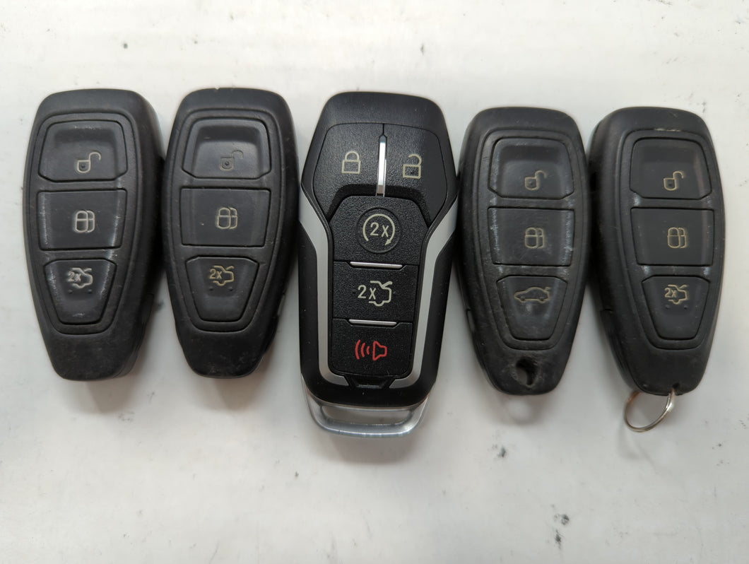 Lot of 5 Ford Keyless Entry Remote Fob MIXED FCC IDS MIXED PART NUMBERS