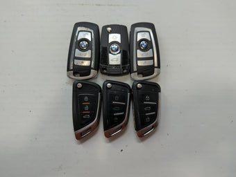compare product Lot of 6 Bmw Keyless Entry Remote Fob MIXED FCC IDS MIXED PART NUMBERS