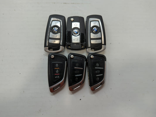 Lot of 6 Bmw Keyless Entry Remote Fob MIXED FCC IDS MIXED PART NUMBERS - Oemusedautoparts1.com