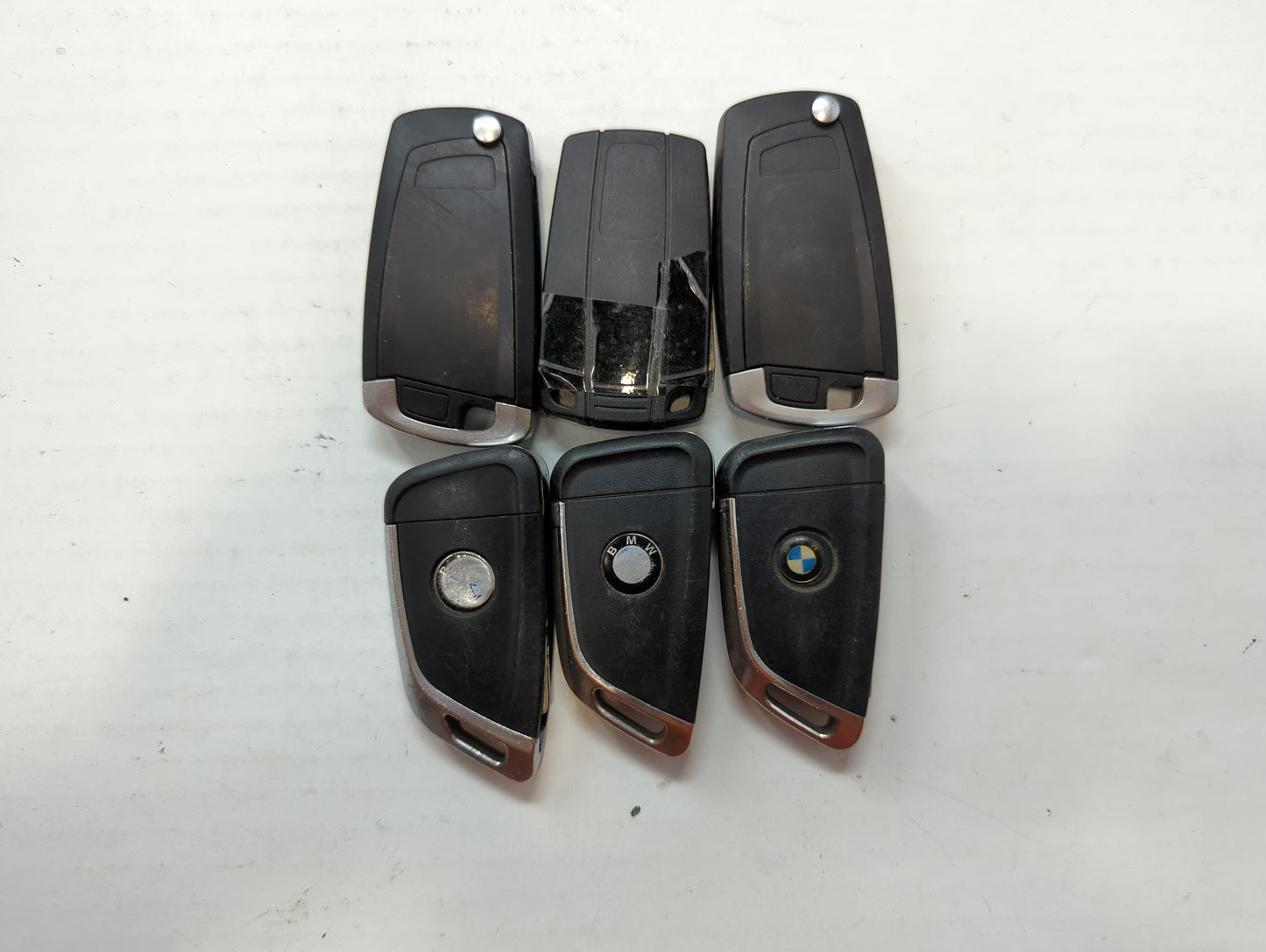 Lot of 6 Bmw Keyless Entry Remote Fob MIXED FCC IDS MIXED PART NUMBERS - Oemusedautoparts1.com