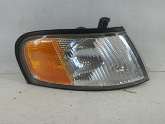 compare product 1998-1999 Nissan Altima Driver Left Oem Head Light Headlight Lamp