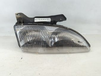 compare product 1995 Chevrolet Cavalier Passenger Right Oem Head Light Headlight Lamp
