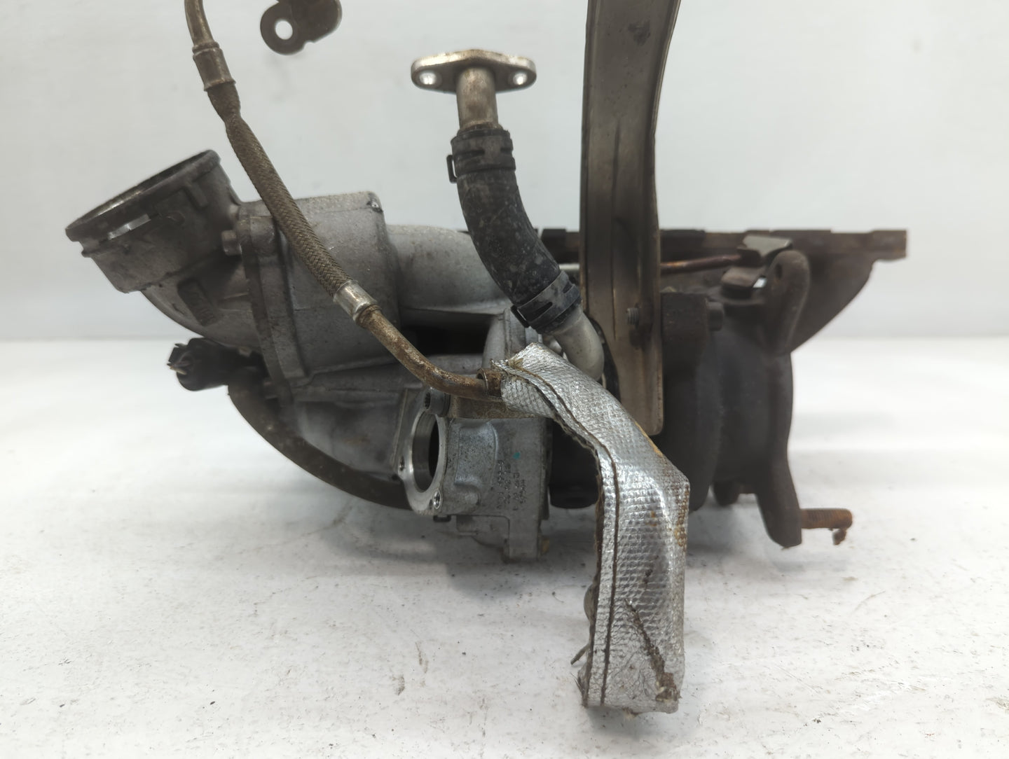 2012 Volkswagen Beetle Turbocharger Exhaust Manifold With Turbo Charger - Oemusedautoparts1.com