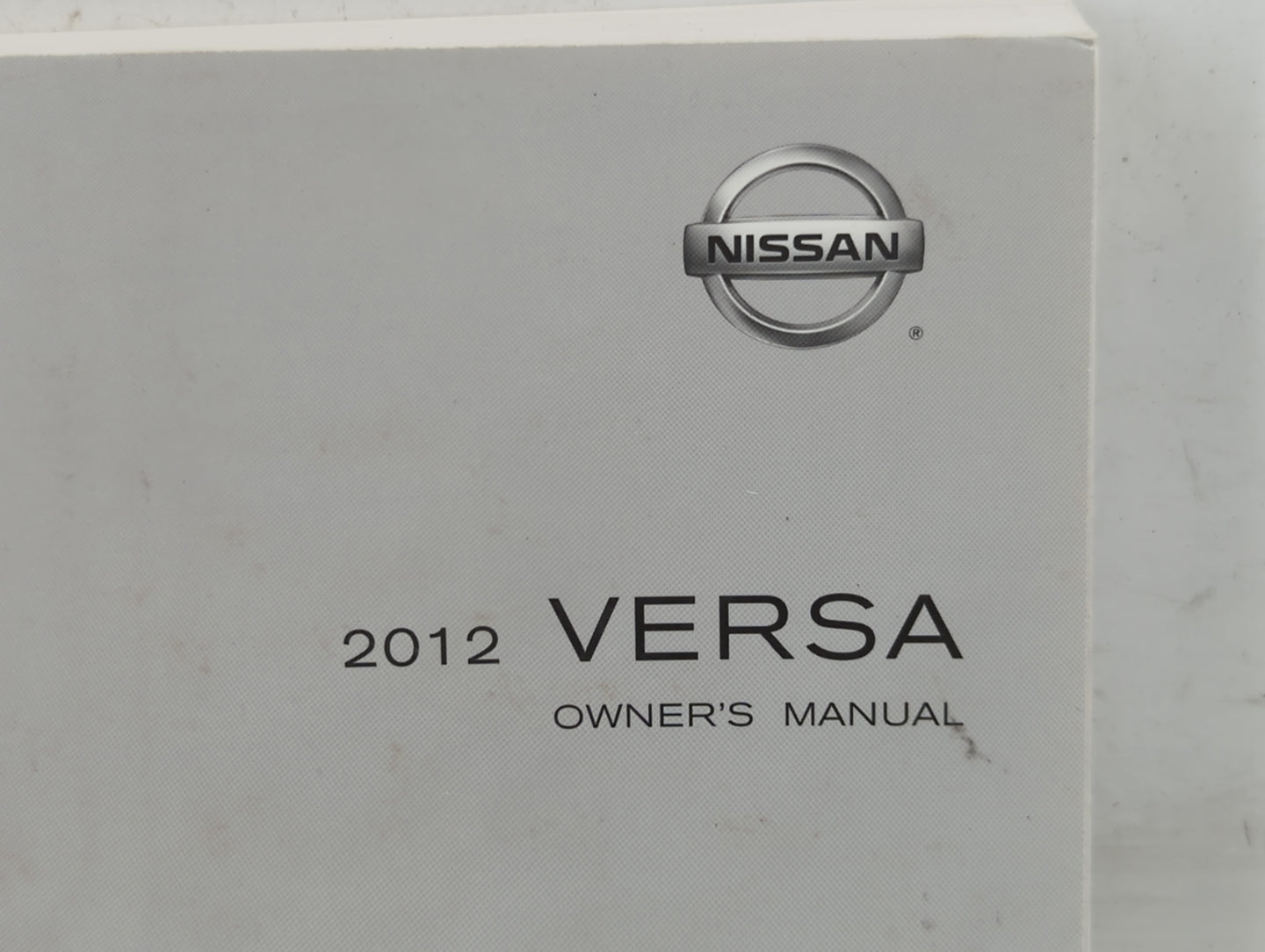 2012 Nissan Versa Owners Manual Book Guide P/N:OM2E 0C11U1 OEM Used Auto Parts - Oemusedautoparts1.com