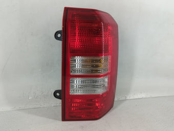 compare product 2007 Jeep Patriot Tail Light Assembly Passenger Right OEM P/N:224134 Fits OEM Used Auto Parts