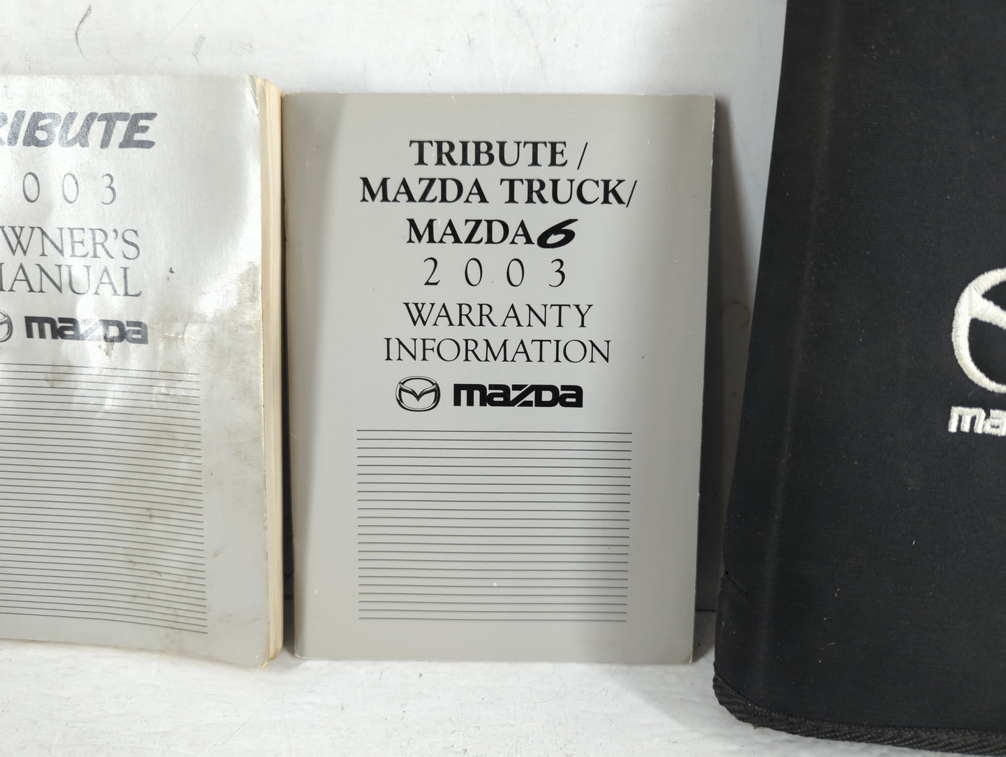 2003 Mazda Tribute Owners Manual Book Guide P/N:9999-95-014C-03 OEM Used Auto Parts - Oemusedautoparts1.com