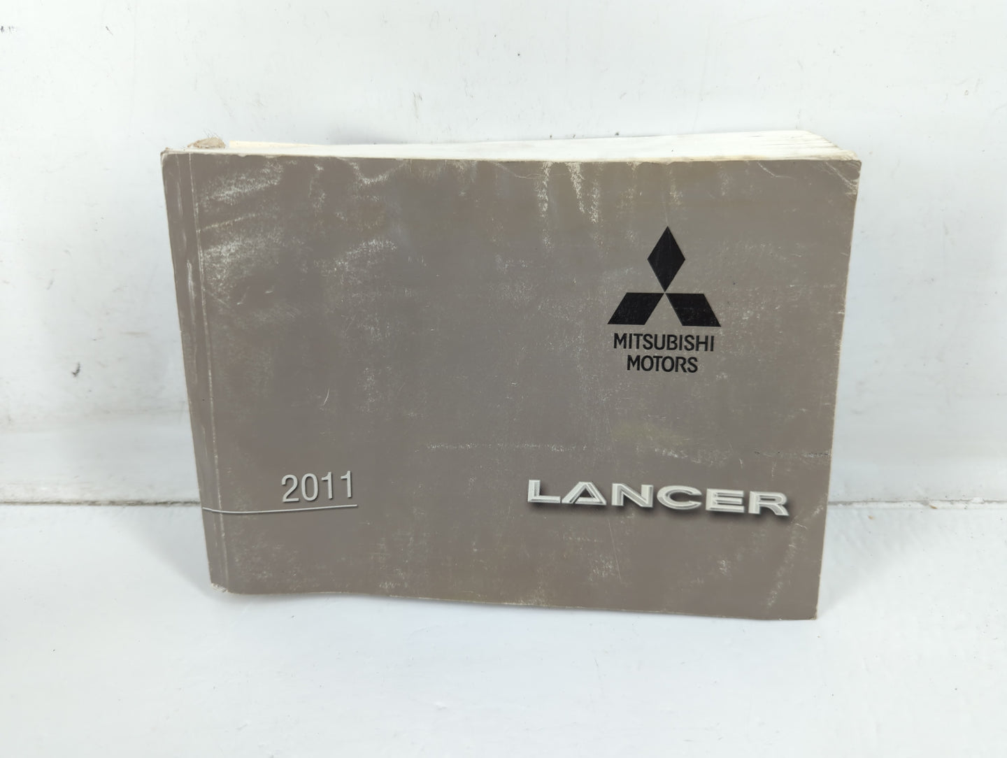 2011 Mitsubishi Lancer Owners Manual Book Guide P/N:9290D512 OEM Used Auto Parts - Oemusedautoparts1.com