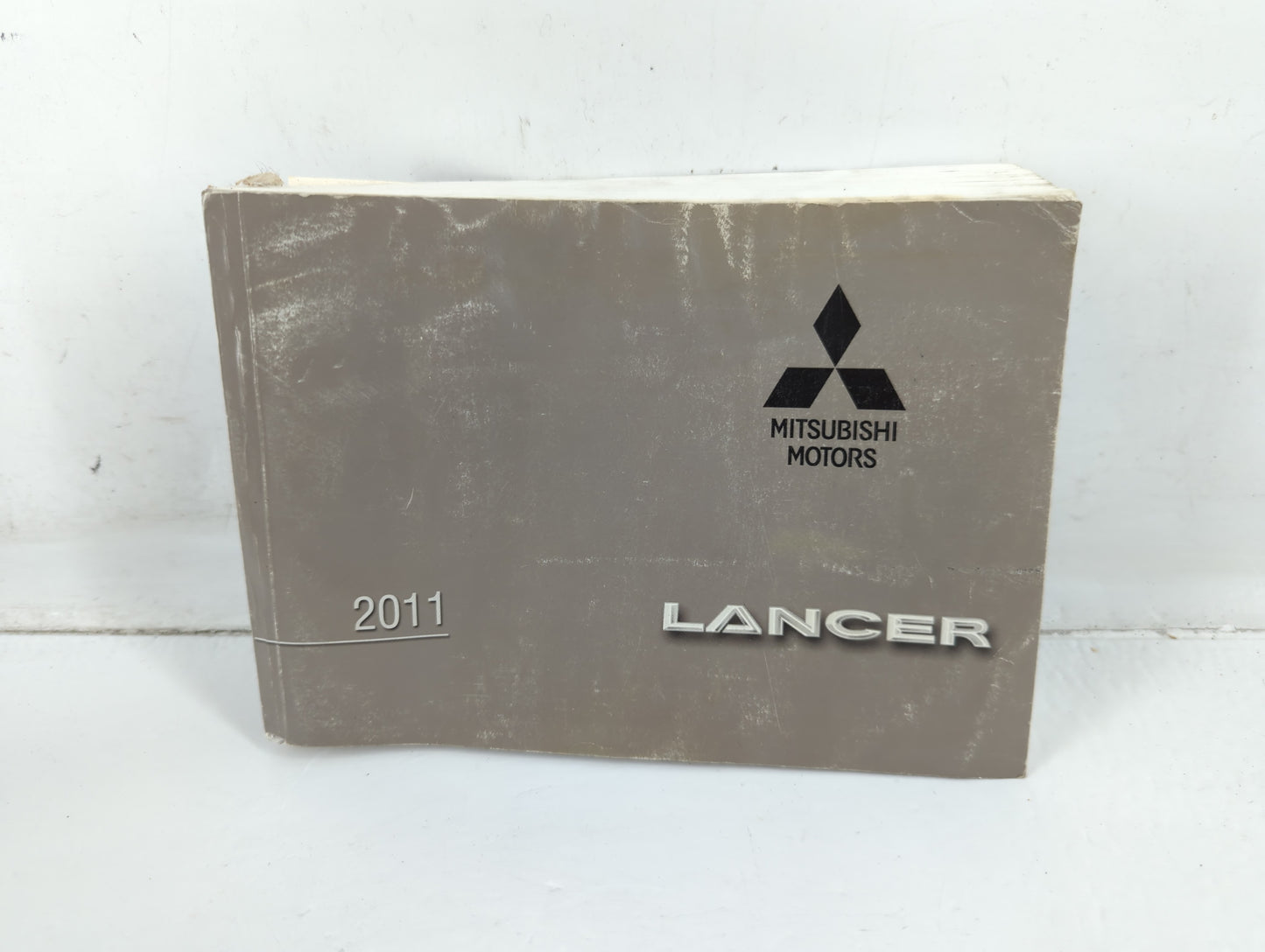 2011 Mitsubishi Lancer Owners Manual Book Guide P/N:9290D512 OEM Used Auto Parts - Oemusedautoparts1.com