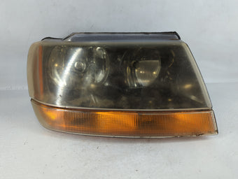 compare product 1999 Jeep Grand Cherokee Passenger Right Oem Head Light Headlight Lamp