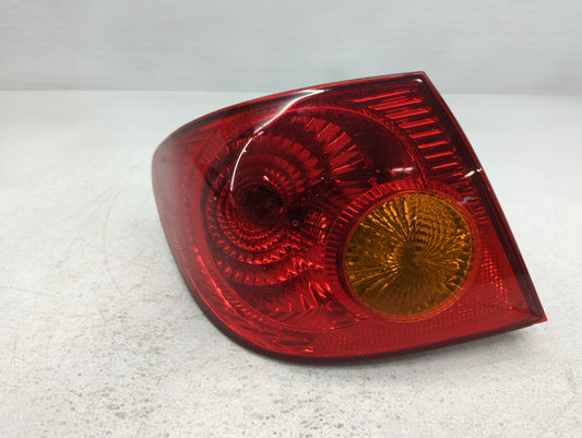 2003-2004 Toyota Corolla Tail Light Assembly Driver Left OEM Fits Fits 2003 2004 OEM Used Auto Parts - Oemusedautoparts1.com
