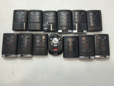 Lot of 13 Cadillac Keyless Entry Remote Fob MIXED FCC IDS MIXED PART