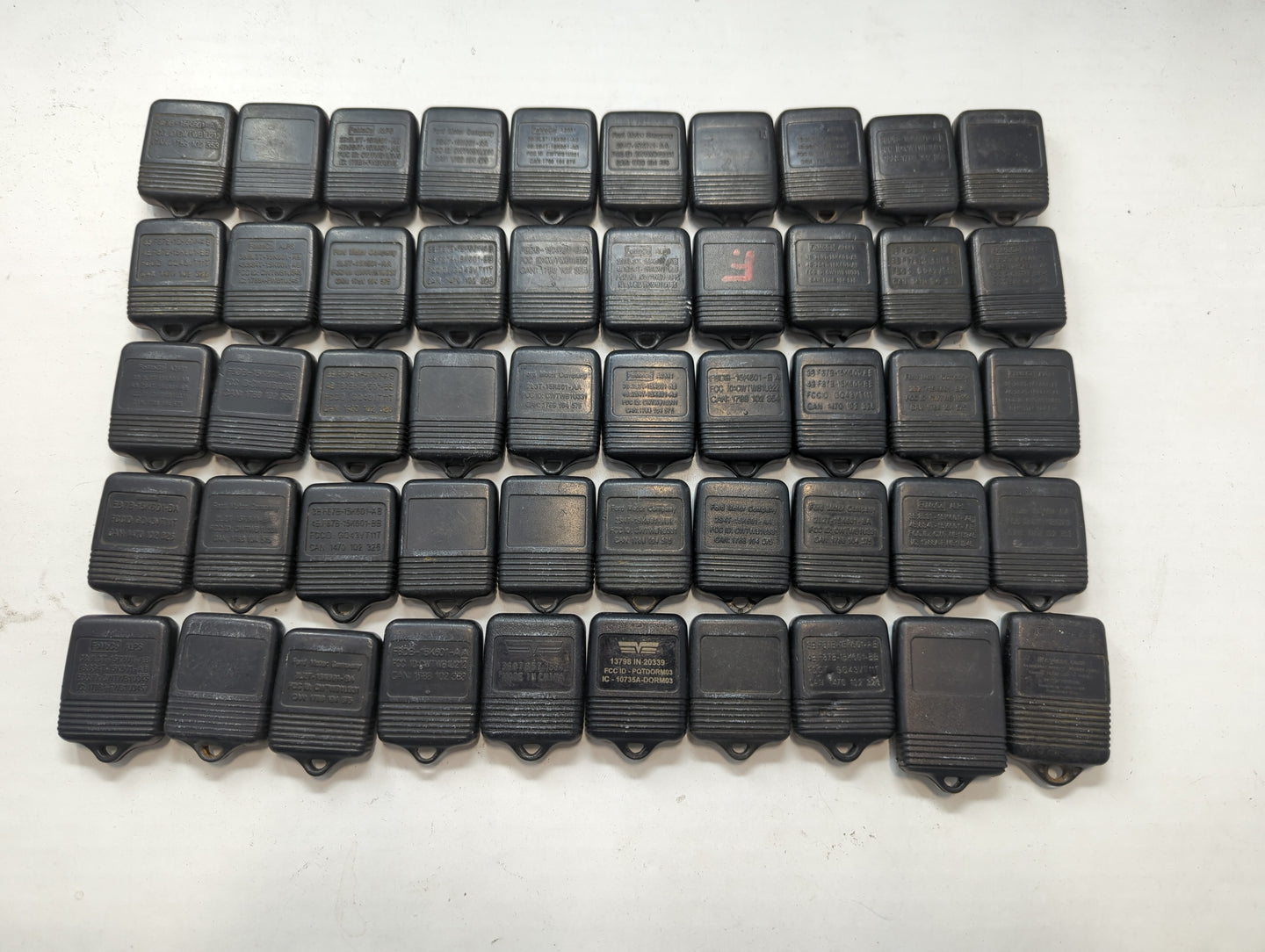 Lot of 50 Ford Keyless Entry Remote Fob MIXED FCC IDS MIXED PART NUMBERS - Oemusedautoparts1.com