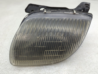 compare product 1995-2002 Pontiac Sunfire Driver Left Oem Head Light Headlight Lamp
