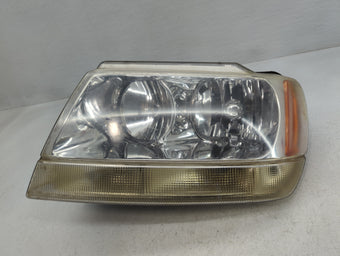 compare product 1999-2004 Jeep Grand Cherokee Driver Left Oem Head Light Headlight Lamp
