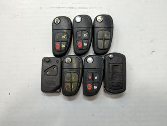 compare product Lot of 7 Jaguar Keyless Entry Remote Fob NHVWB1U241 | LQN1821