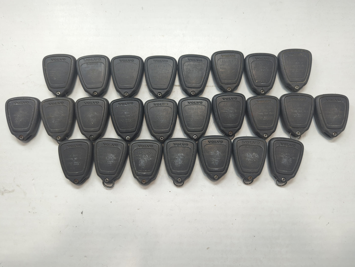 Lot of 25 Volvo Keyless Entry Remote Fob LQNP2T-APU MIXED PART NUMBERS - Oemusedautoparts1.com