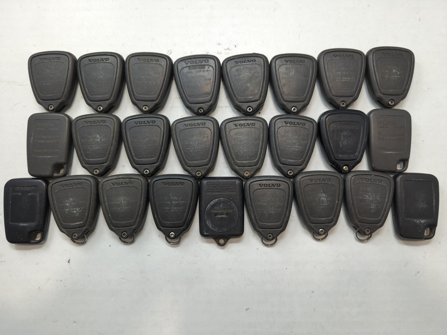 Lot of 25 Volvo Keyless Entry Remote Fob LQNP2T-APU MIXED PART NUMBERS - Oemusedautoparts1.com