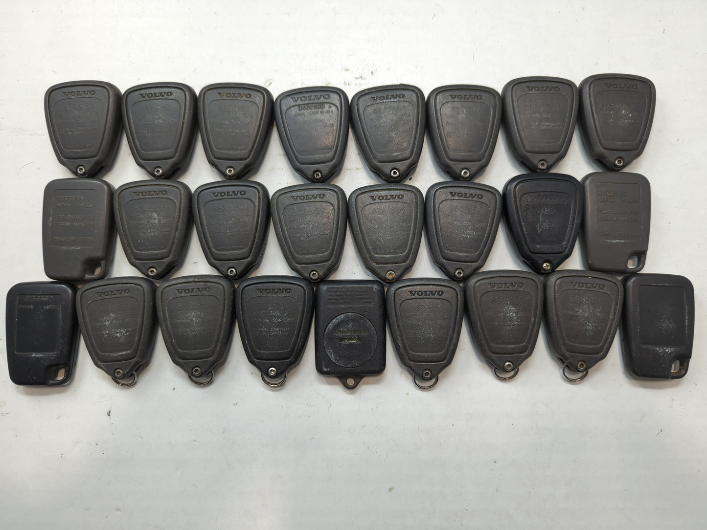 Lot of 25 Volvo Keyless Entry Remote Fob LQNP2T-APU MIXED PART NUMBERS - Oemusedautoparts1.com