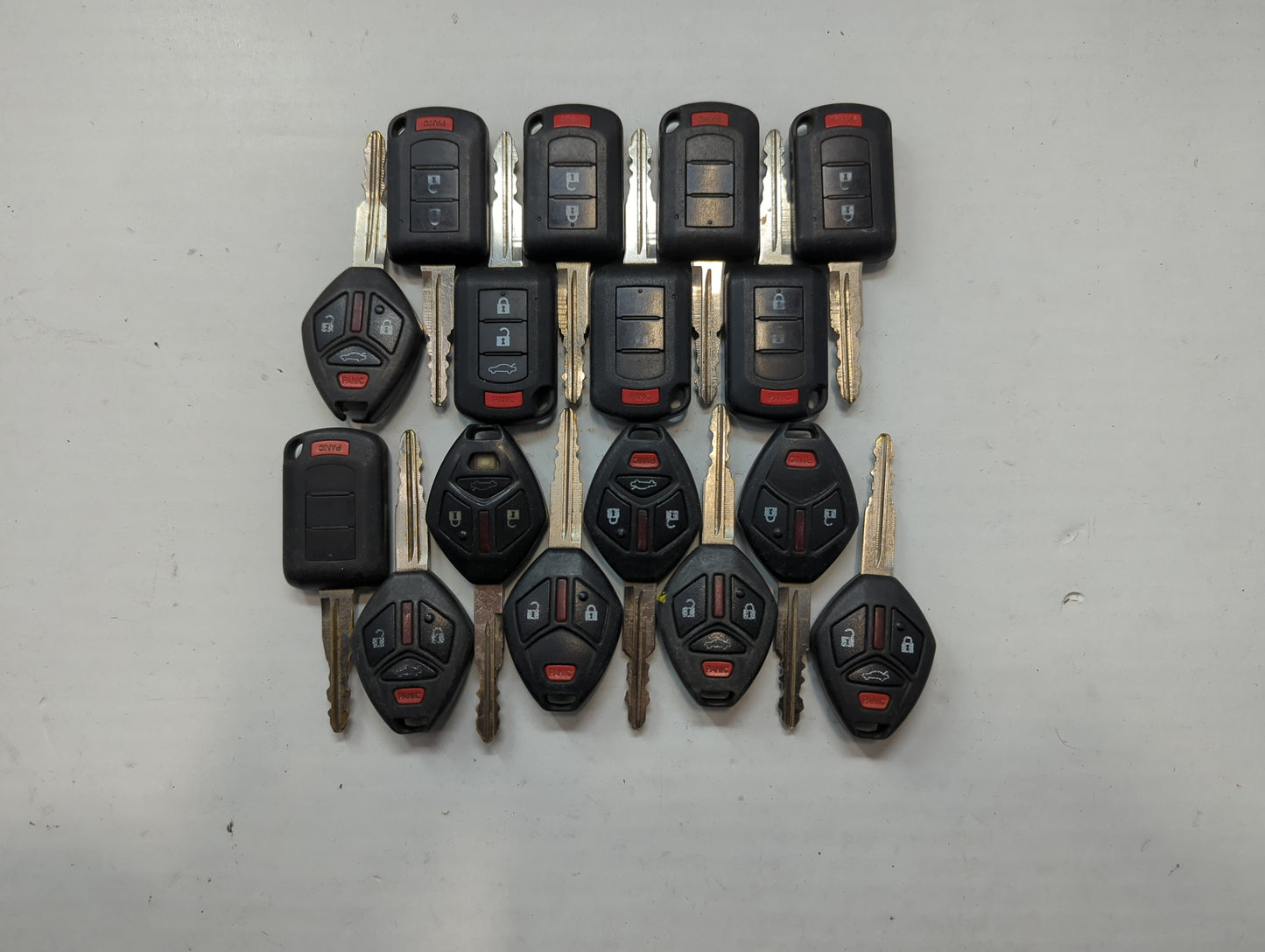 Lot of 16 Mitsubishi Keyless Entry Remote Fob MIXED FCC IDS MIXED PART - Oemusedautoparts1.com