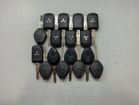 Lot of 16 Mitsubishi Keyless Entry Remote Fob MIXED FCC IDS MIXED PART - Oemusedautoparts1.com