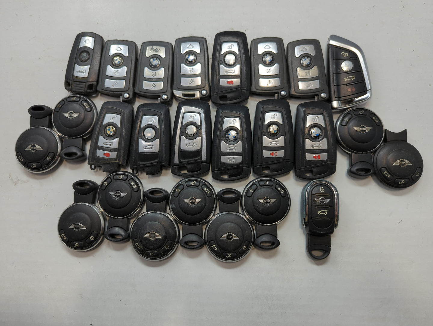 Lot of 25 Bmw Keyless Entry Remote Fob MIXED FCC IDS MIXED PART NUMBERS - Oemusedautoparts1.com