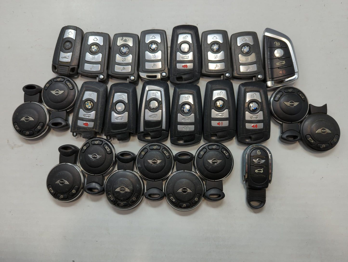 Lot of 25 Bmw Keyless Entry Remote Fob MIXED FCC IDS MIXED PART NUMBERS - Oemusedautoparts1.com