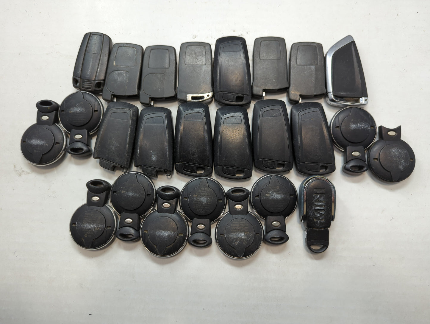 Lot of 25 Bmw Keyless Entry Remote Fob MIXED FCC IDS MIXED PART NUMBERS - Oemusedautoparts1.com