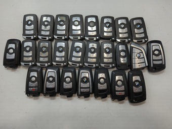 compare product Lot of 25 Bmw Keyless Entry Remote Fob MIXED FCC IDS MIXED PART NUMBERS