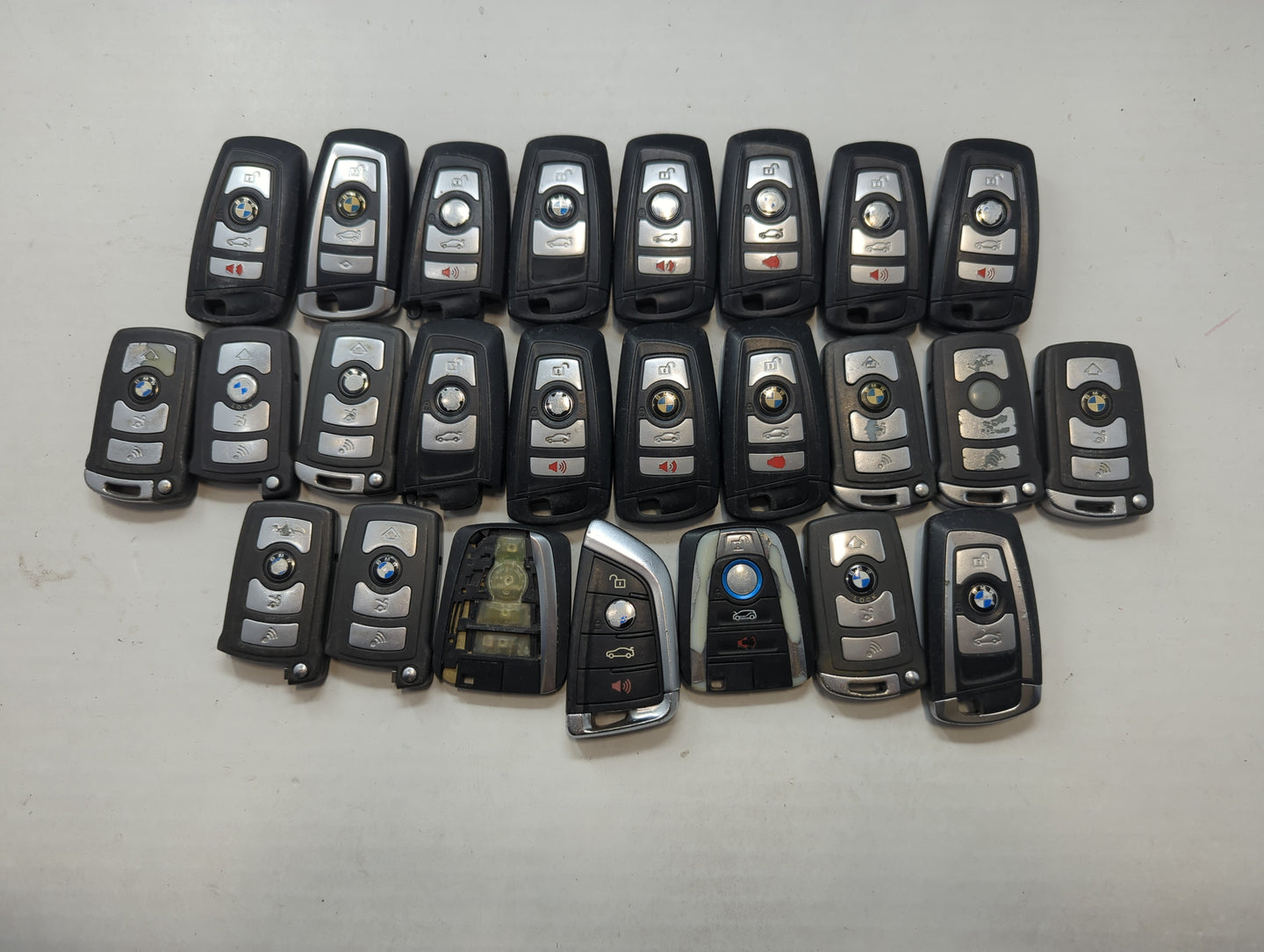 Lot of 25 Bmw Keyless Entry Remote Fob MIXED FCC IDS MIXED PART NUMBERS - Oemusedautoparts1.com