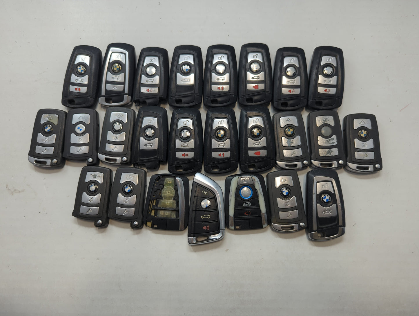 Lot of 25 Bmw Keyless Entry Remote Fob MIXED FCC IDS MIXED PART NUMBERS - Oemusedautoparts1.com