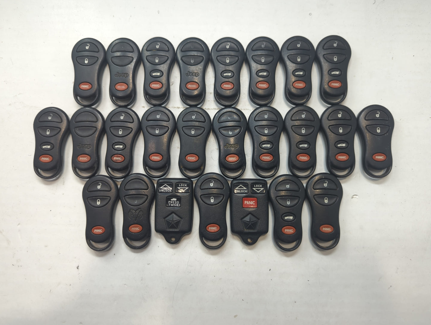Lot of 25 Dodge Keyless Entry Remote Fob MIXED FCC IDS MIXED PART NUMBERS - Oemusedautoparts1.com