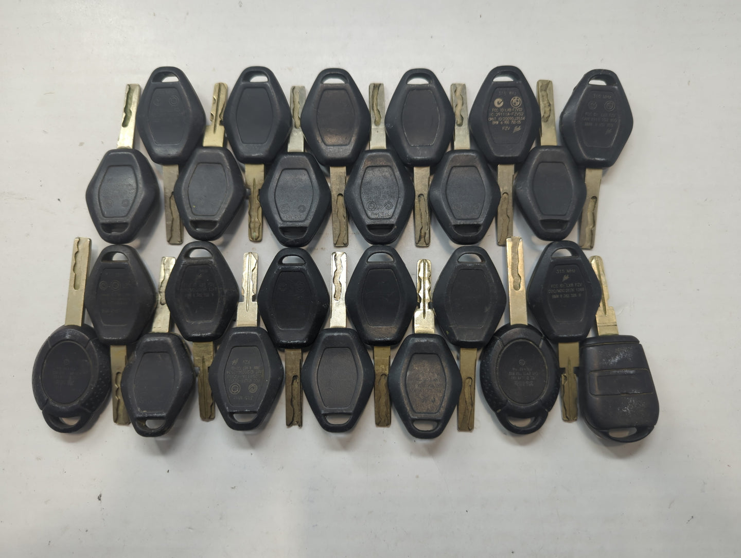Lot of 25 Bmw Keyless Entry Remote Fob MIXED FCC IDS MIXED PART NUMBERS - Oemusedautoparts1.com