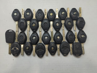 compare product Lot of 25 Bmw Keyless Entry Remote Fob MIXED FCC IDS MIXED PART NUMBERS