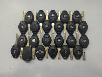 compare product Lot of 25 Bmw Keyless Entry Remote Fob MIXED FCC IDS MIXED PART NUMBERS