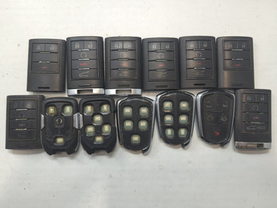 Lot of 13 Cadillac Keyless Entry Remote Fob MIXED FCC IDS MIXED PART